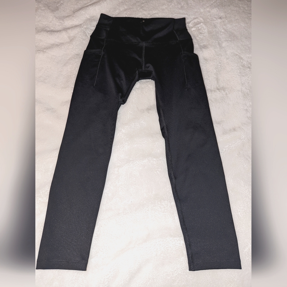 Apana black legging with side pockets for your cell phone or anything else ..